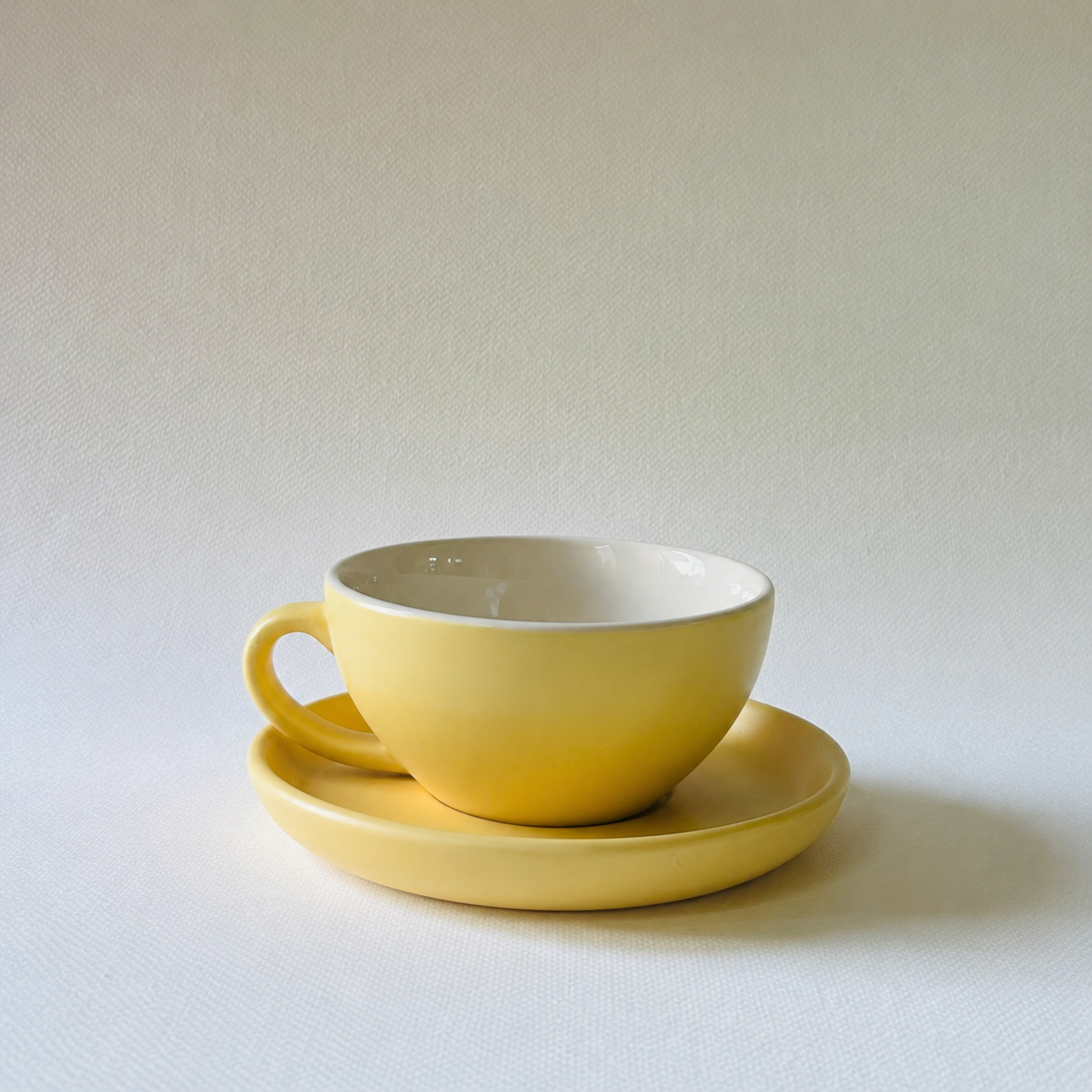 The jaune Cappucino Cup & Saucer Set
